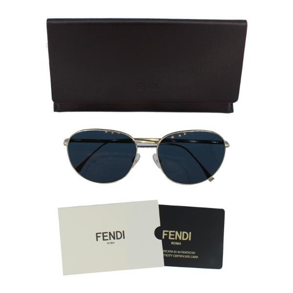 Fendi women's sunglasses blue lenses gold tone frame, UK version