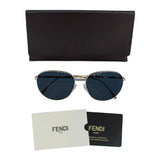 Fendi women's sunglasses blue lenses gold tone frame, UK version