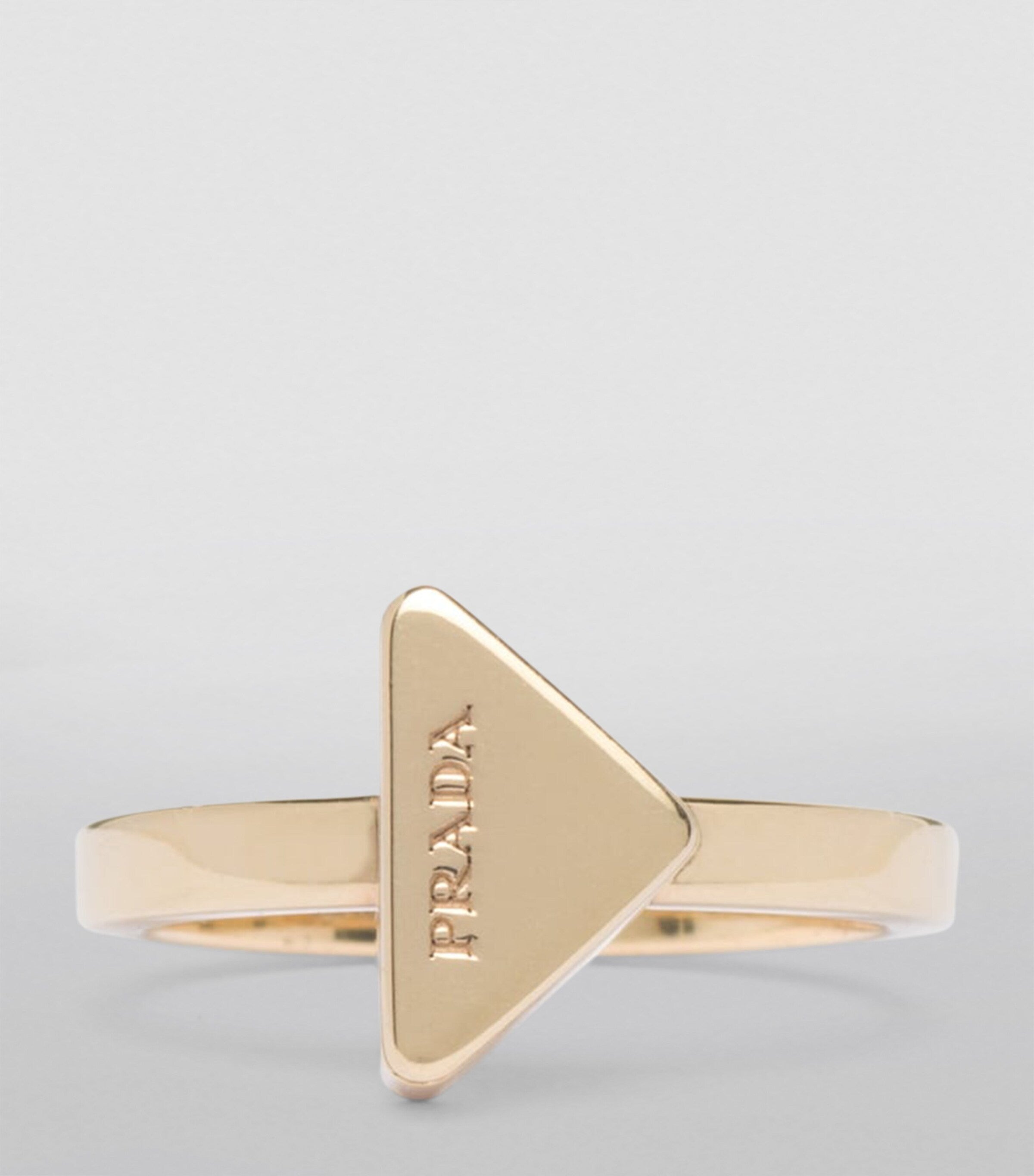 Prada triangle ring brass Italian design, imported from the UK