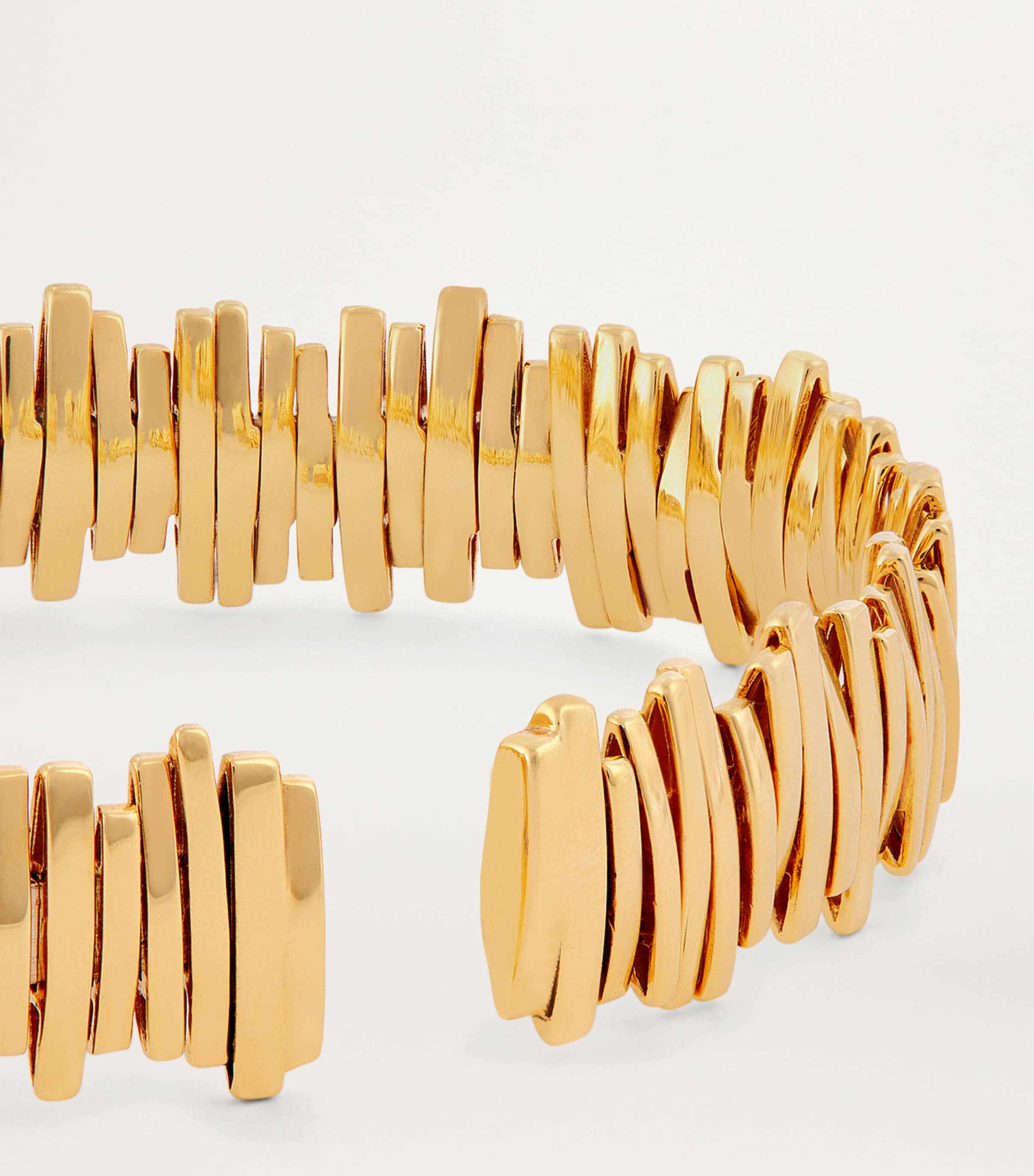 Suzanne Kalan yellow gold jagged bangle, imported from the UK