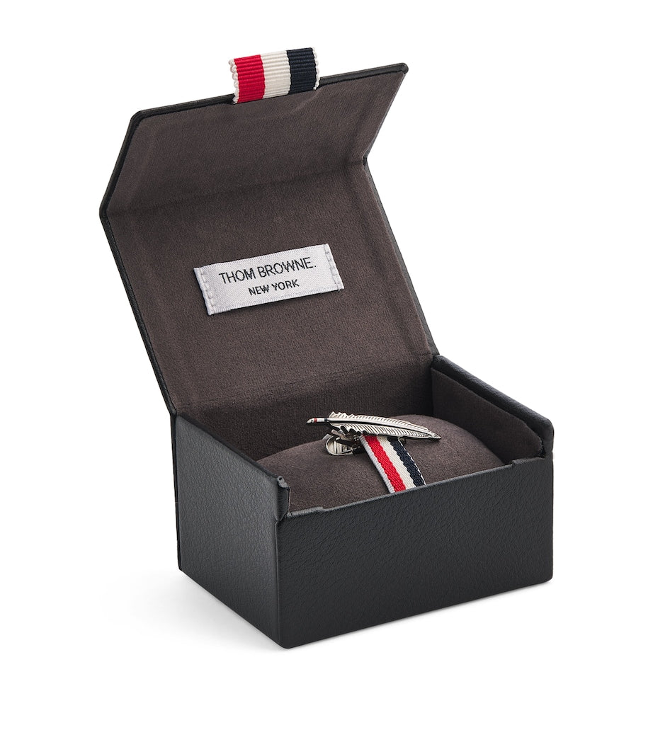 Thom Browne feather tie bar in sterling silver, imported from the UK