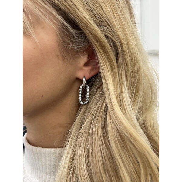SVNX ribbed oval hoop earrings in silver, imported from the UK