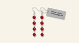 Dior gunmetal drop earrings with ruby crystals, imported from the UK