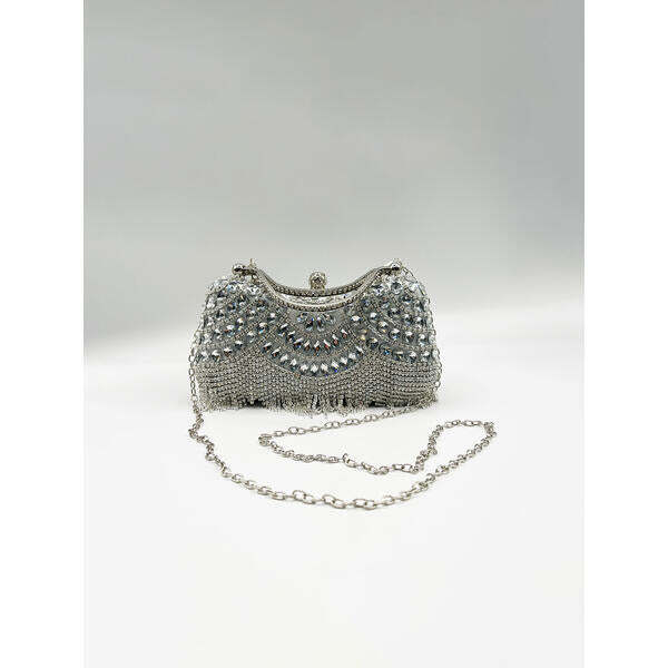 SVNX embellished fringe clutch bag in silver (British brand)