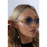 SVNX rimless oval geometric sunglasses in gold blue - British product