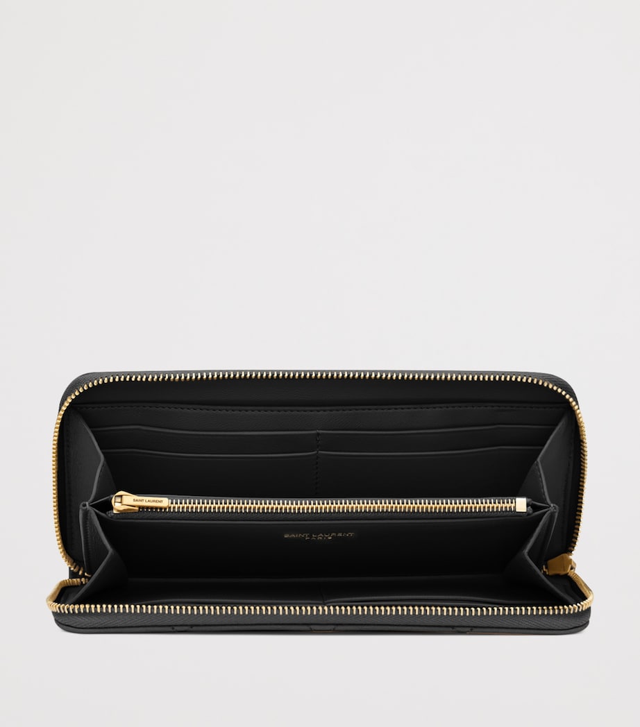Saint Laurent Matelassé zip-up wallet with YSL monogram (British brand)