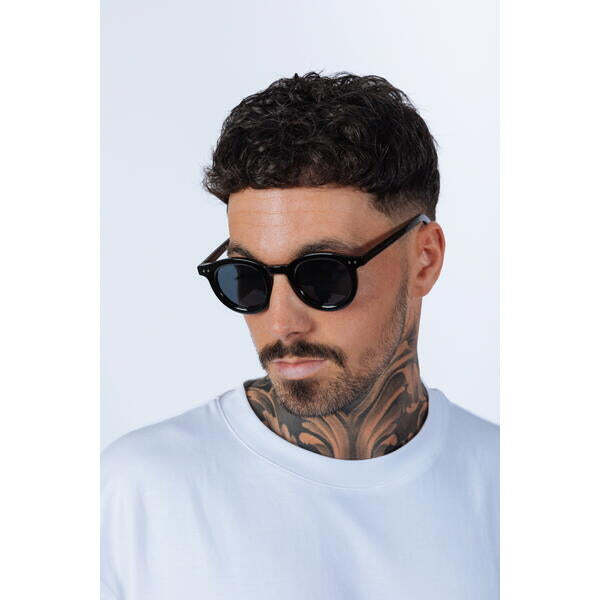 SVNX bold rounded sunglasses in black, imported from the UK
