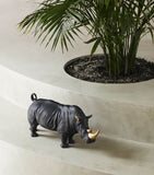 Lladró porcelain rhino figurine with gold accents, 22cm high, UK version