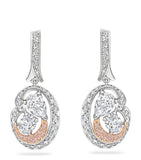 Boodles Motherhood diamond earrings in platinum and rose gold (British brand)