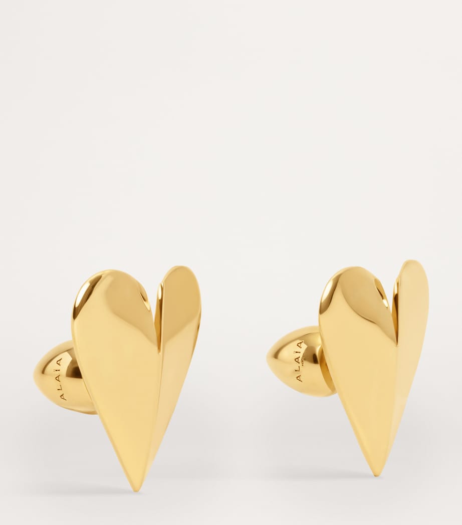 Alaïa Le Coeur mini brass earrings (British brand)