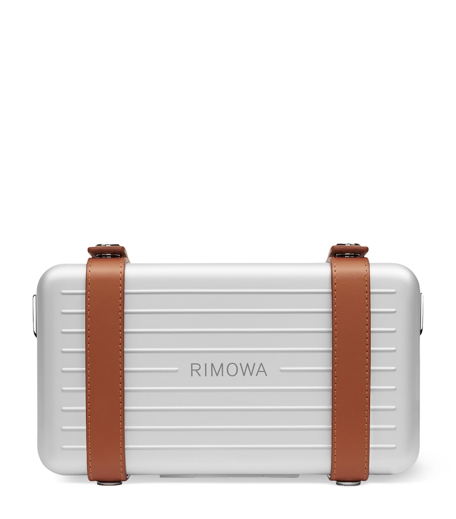 RIMOWA aluminium cross-body bag with leather strap (British brand)