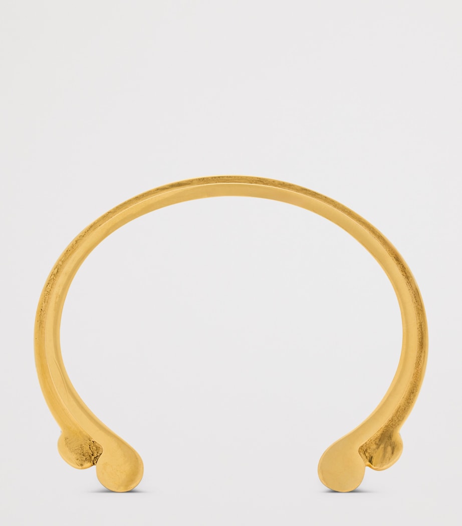 Saint Laurent Scroll Open Cuff Bracelet brass, imported from the UK