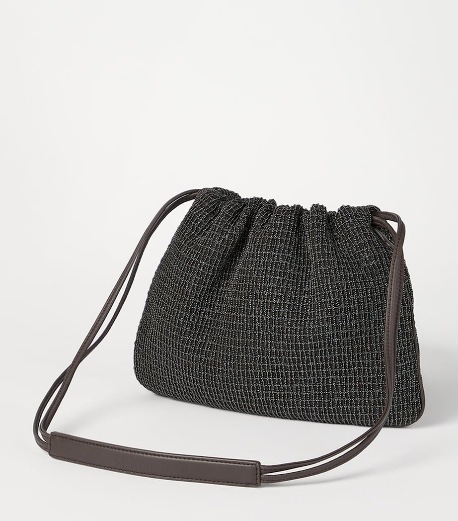 Brunello Cucinelli embellished drawstring cross-body bag, imported from the UK