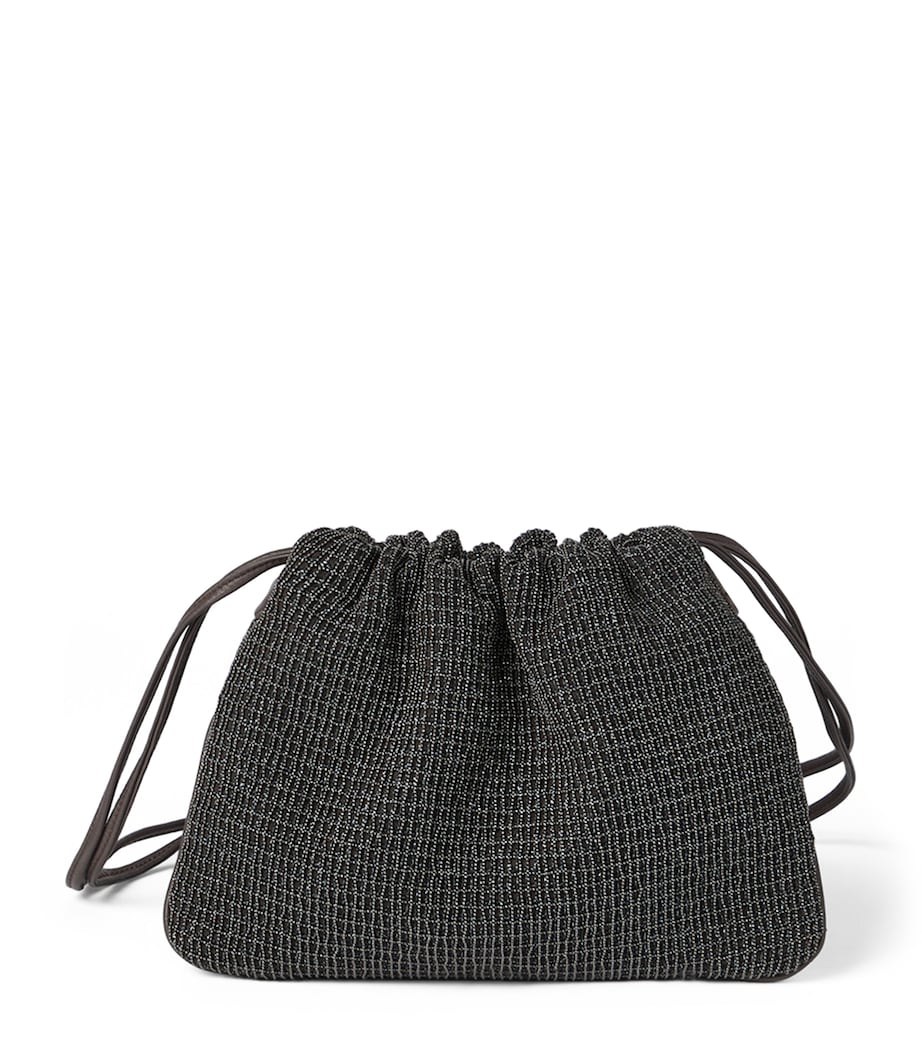 Brunello Cucinelli embellished drawstring cross-body bag, imported from the UK