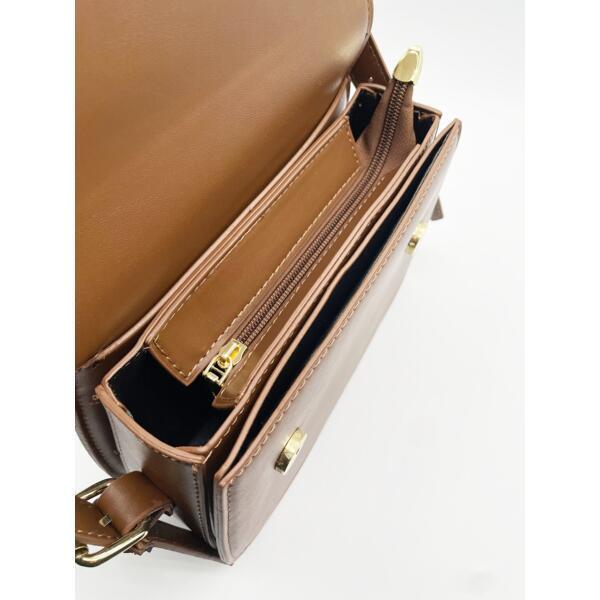 SVNX rounded crossbody bag in brown (British brand)