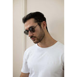 SVNX classic round sunglasses with mirror lenses and matte black frame (British brand)