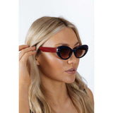 SVNX oval cat-eye sunglasses in navy burg, imported from the UK
