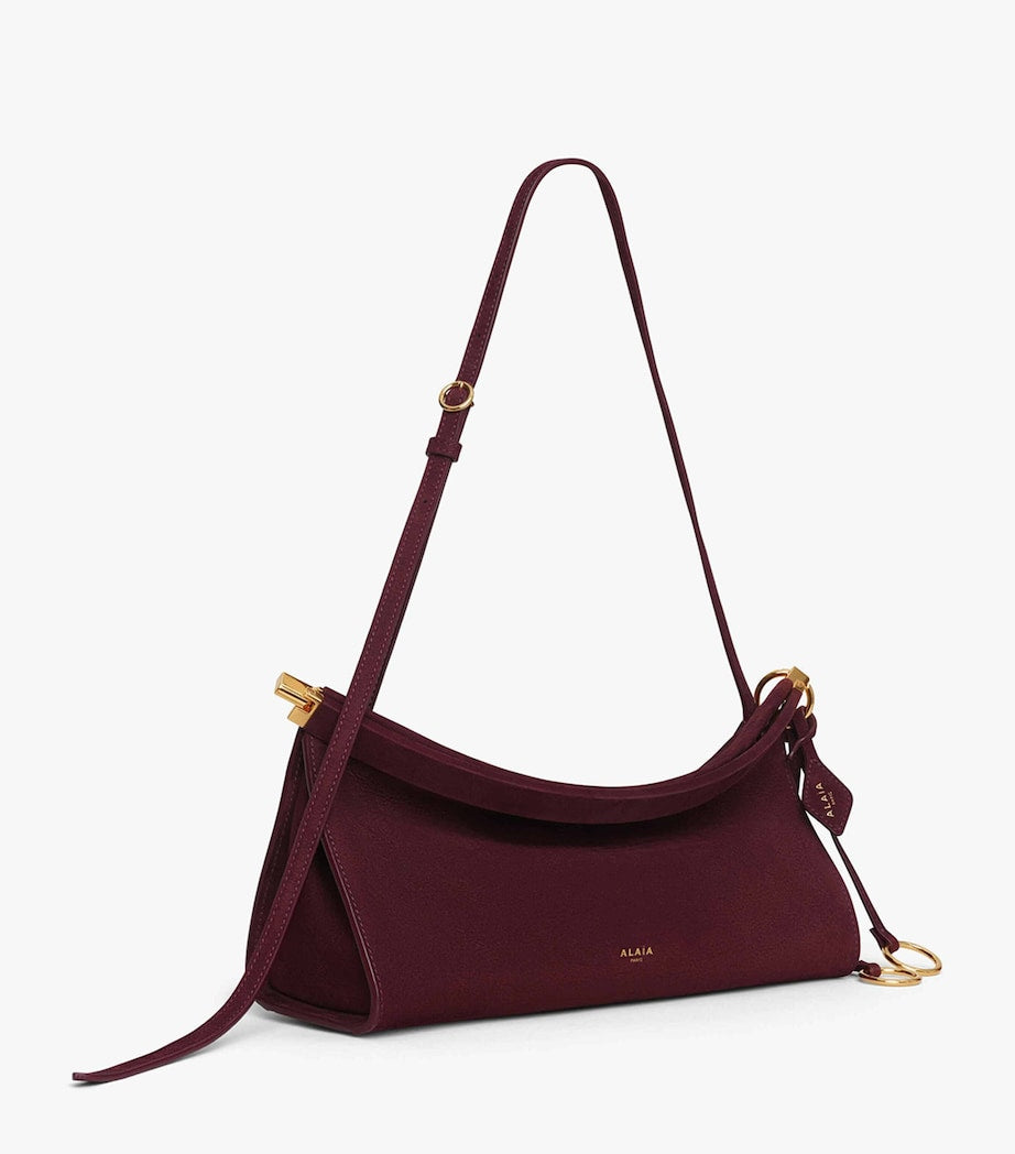 Alaïa Le Click East West shoulder bag, imported from the UK
