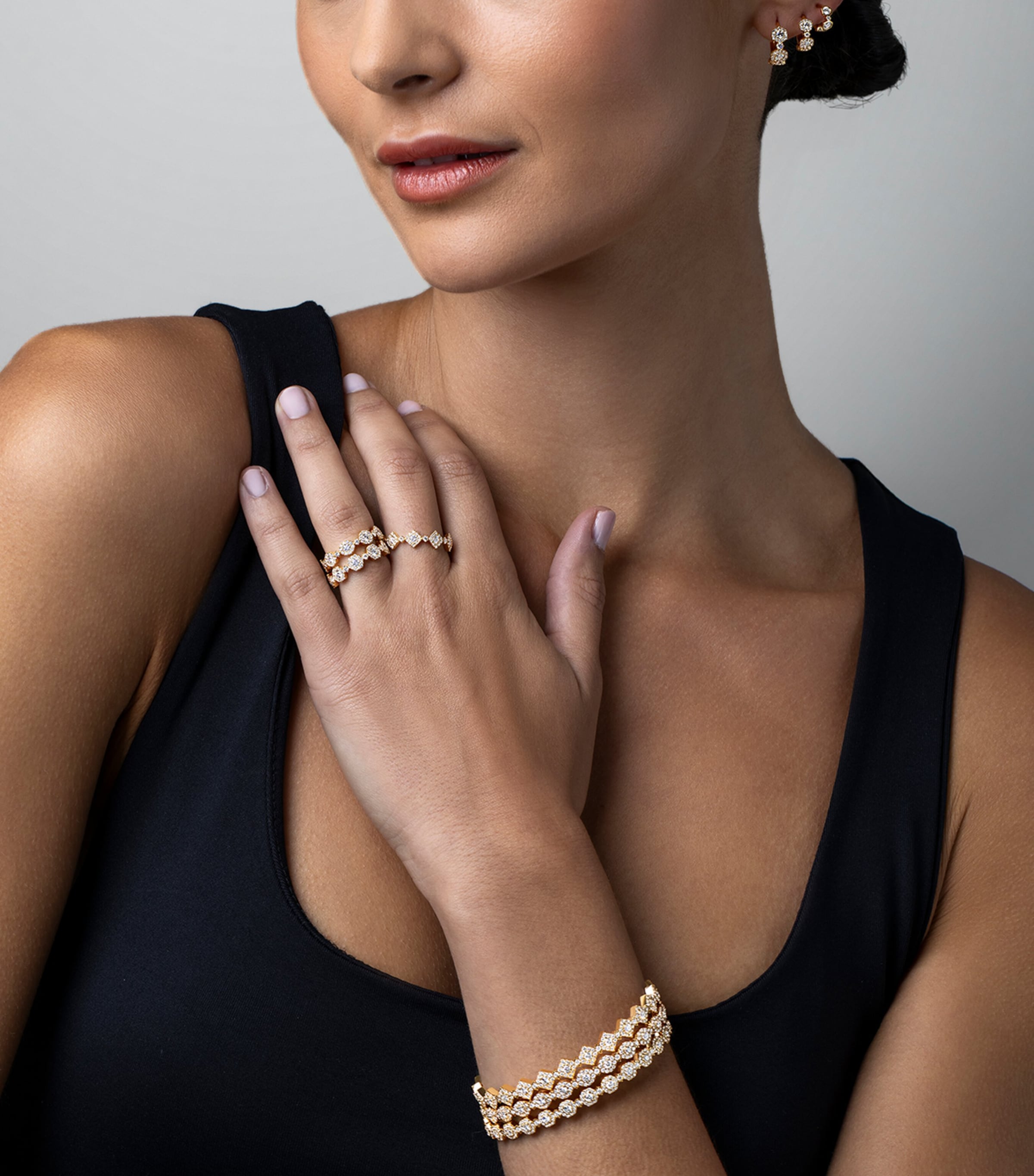 David Morris oval yellow gold diamond bangle (British brand)