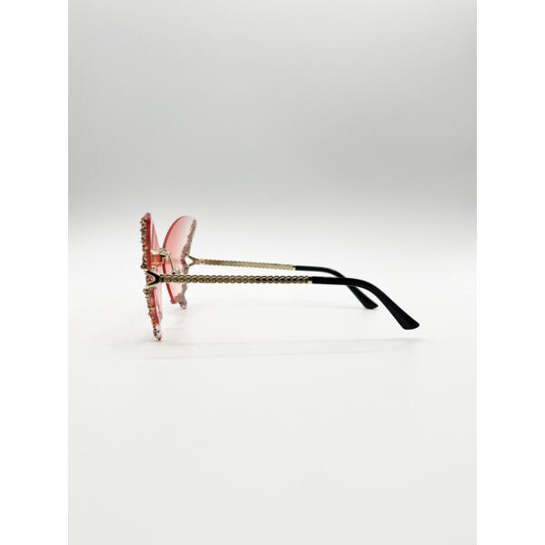 SVNX butterfly sunglasses with gradient pink lenses and gold frame (British brand)