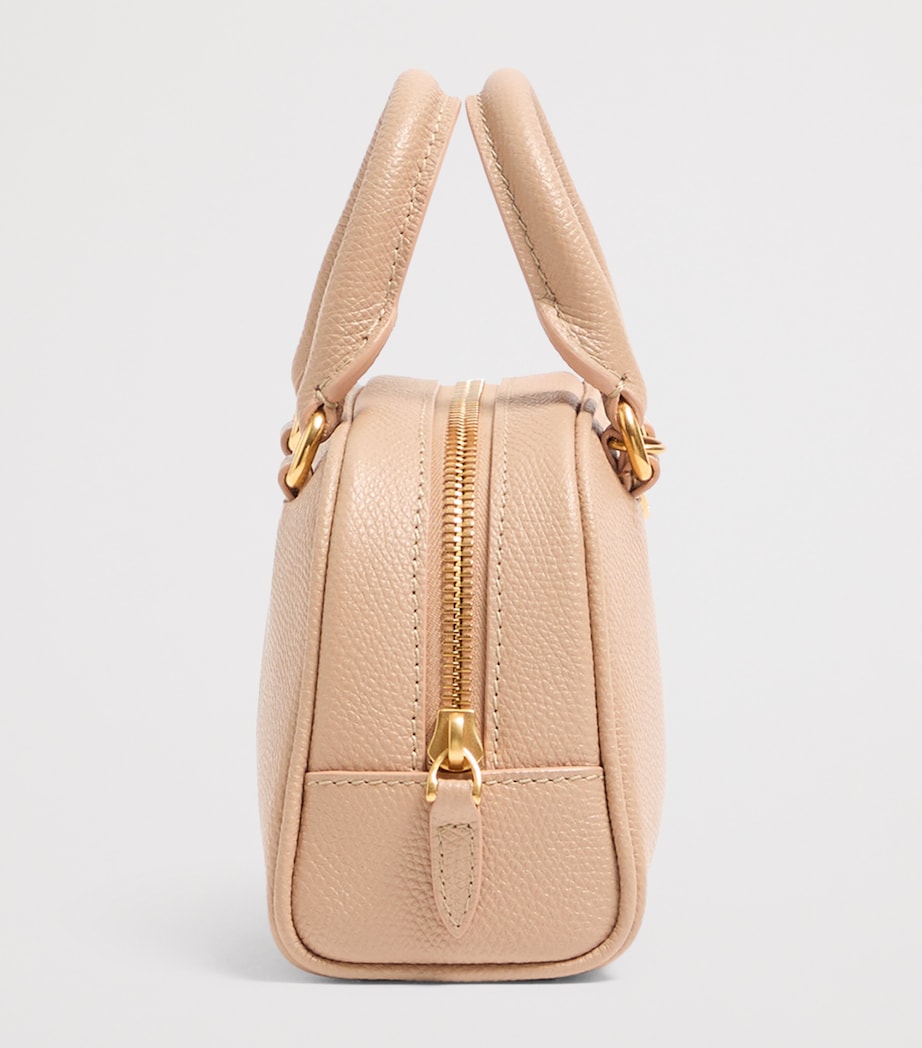 Valentino Garavani mini grained leather VLogo Signature bag, imported from the UK