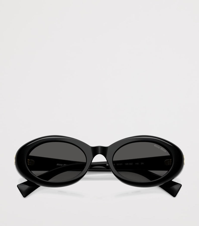 Miu Miu oval wrap-around sunglasses (British brand)
