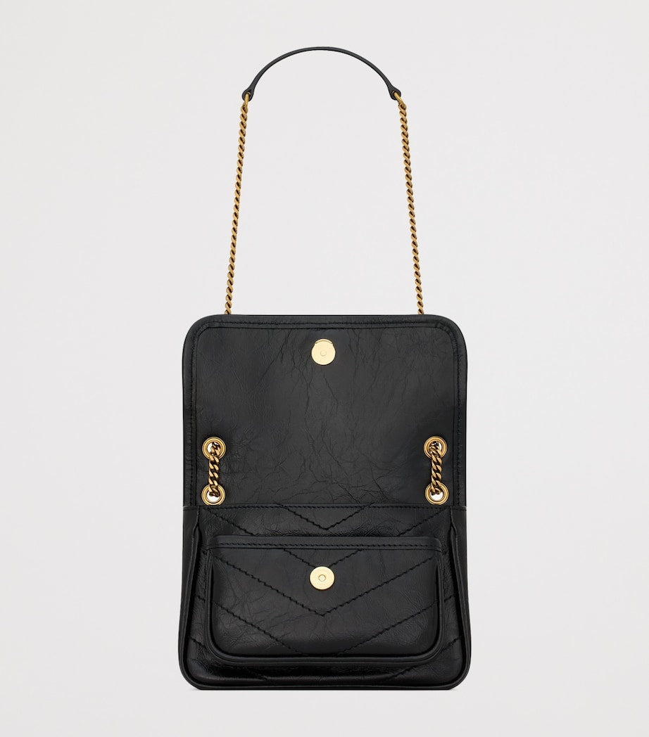 Saint Laurent Mini Niki shoulder bag with YSL monogram, imported from the UK