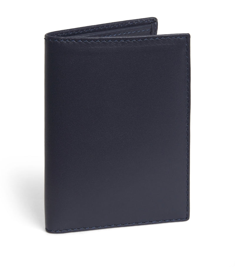 Comme des Garçons leather bifold card holder 10x7cm, imported from the UK