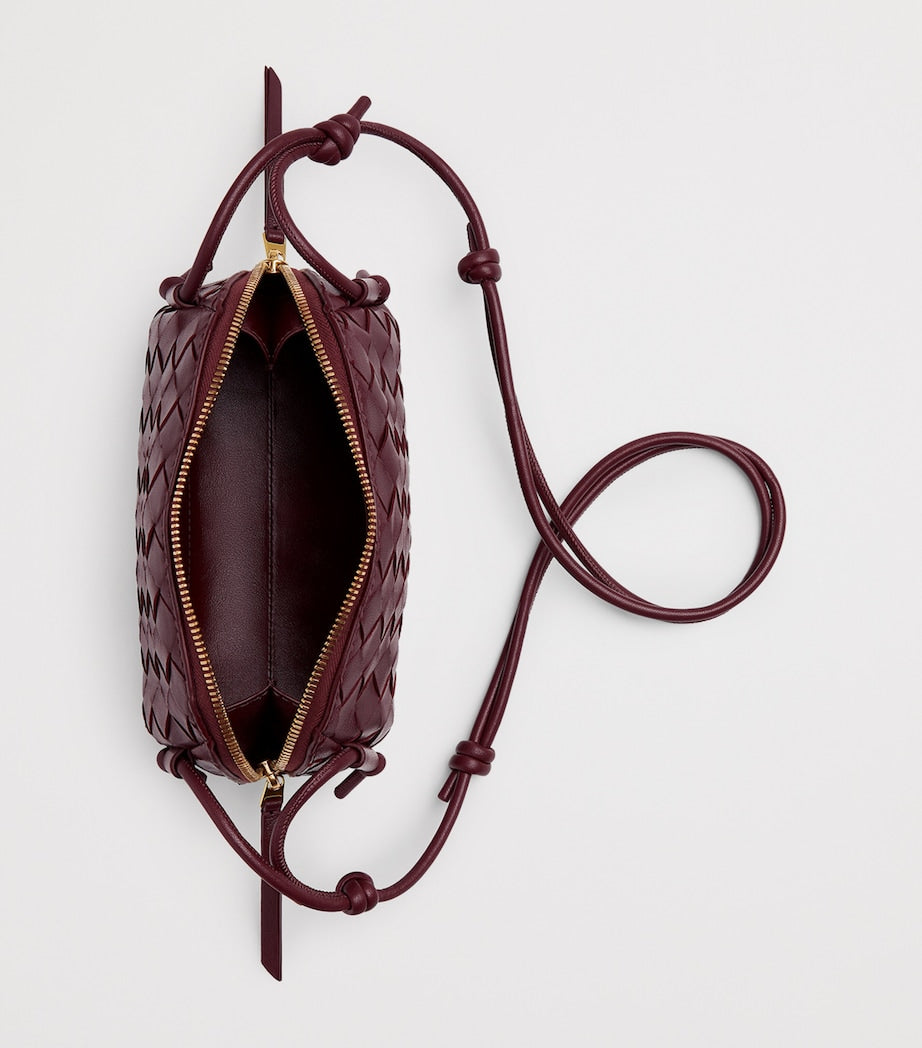 Bottega Veneta compact leather concert pouch (British brand)