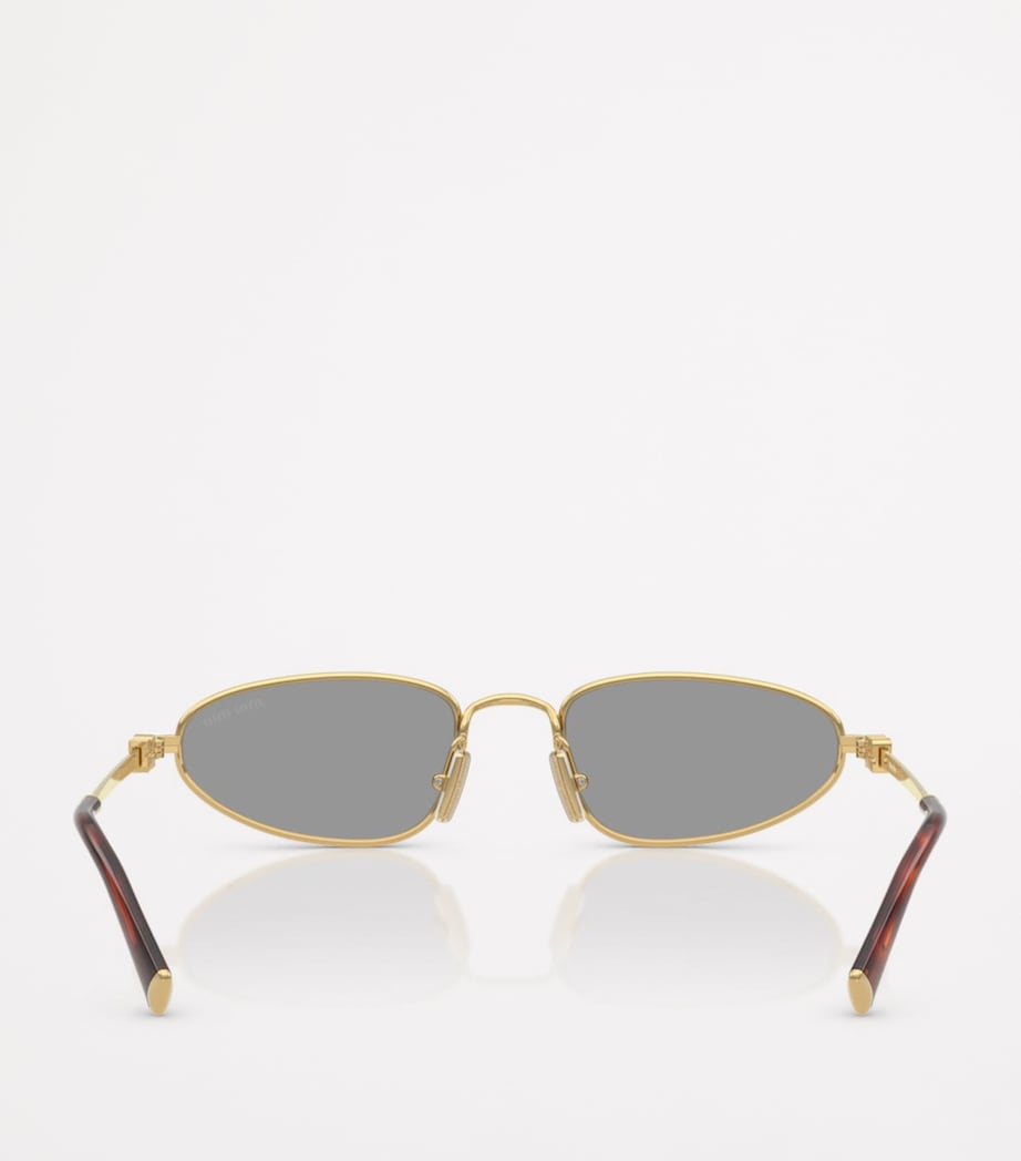 Miu Miu oval sunglasses metal frame - British product