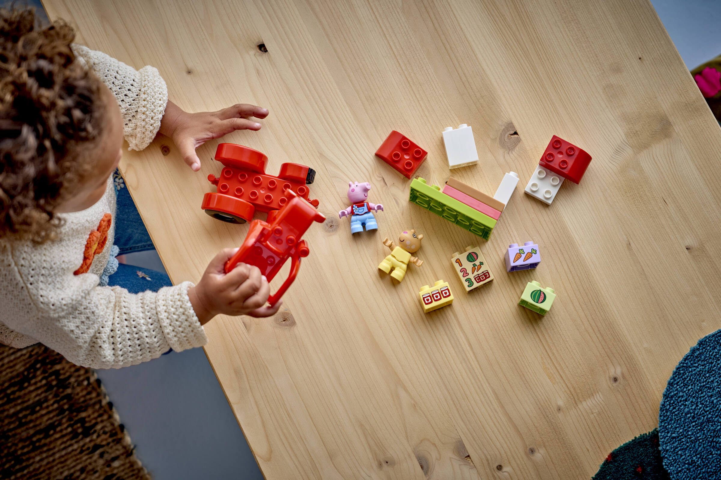 LEGO DUPLO Peppa Pig Tractor and Market building toy, UK version