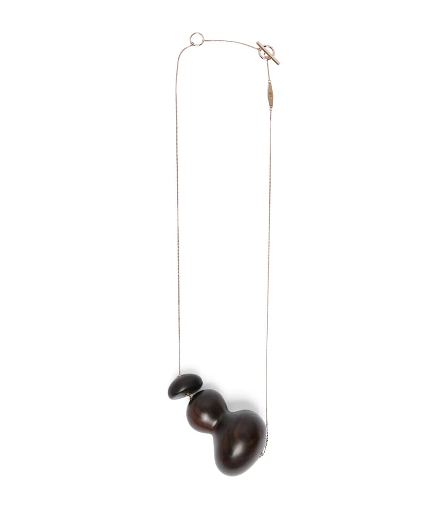 Max Mara ebony pendant necklace gold-tone chain, imported from the UK