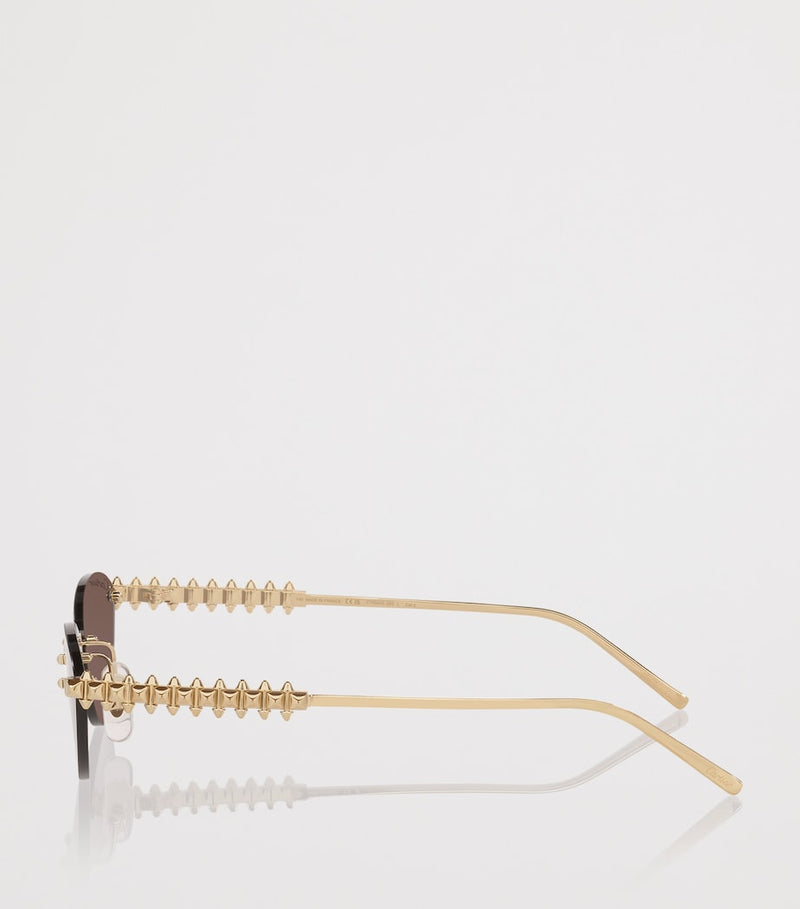Cartier cat-eye sunglasses with gold-tone metal frames - British product