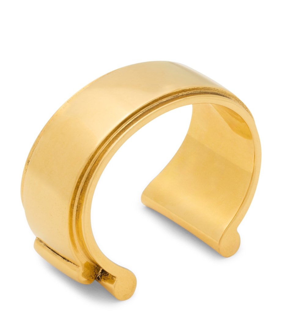 Saint Laurent Scroll Open Cuff Bracelet brass, imported from the UK