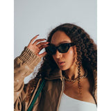 SVNX black angular cat-eye sunglasses, imported from the UK