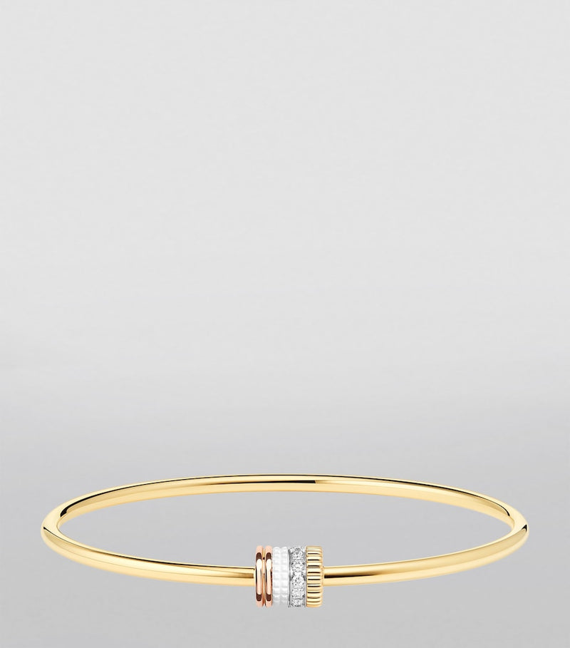 Boucheron Quatre White Edition gold diamond bangle (British brand)