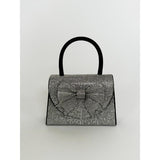 SVNX rhinestone grab bag with bow detail - British product