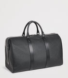 Harrods leather holdall with gunmetal hardware, imported from the UK