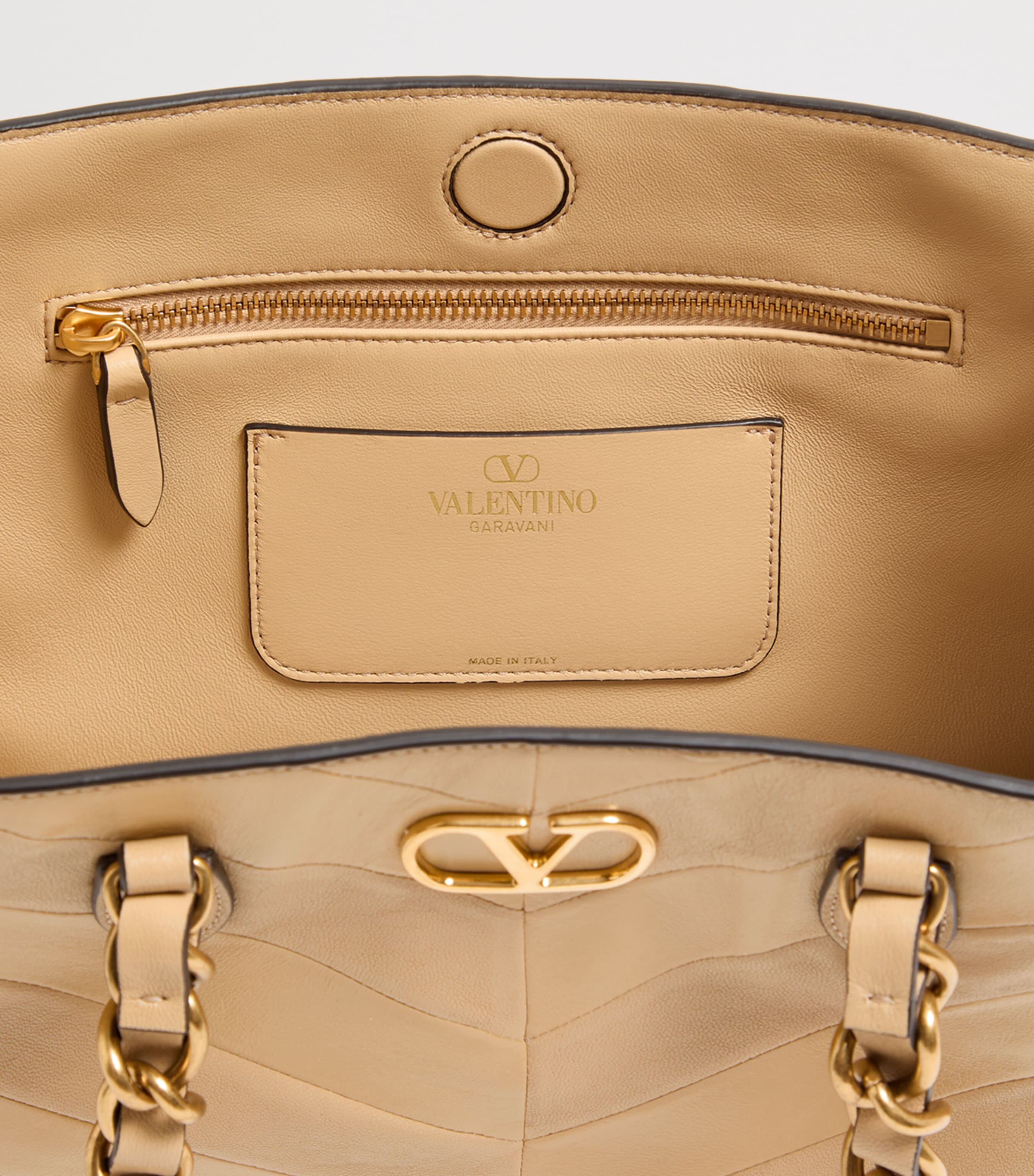 Valentino Garavani small lambskin Laseine tote bag, imported from the UK
