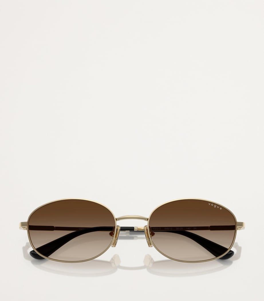 Vogue metal sunglasses with graduated tint lenses, imported from the UK