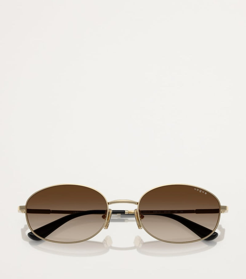Vogue metal sunglasses with graduated tint lenses, imported from the UK