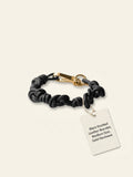 Prada braided leather bracelet, imported from the UK