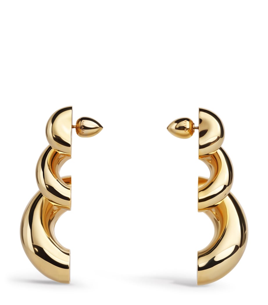 Alaïa Torsion Drop earrings, imported from the UK