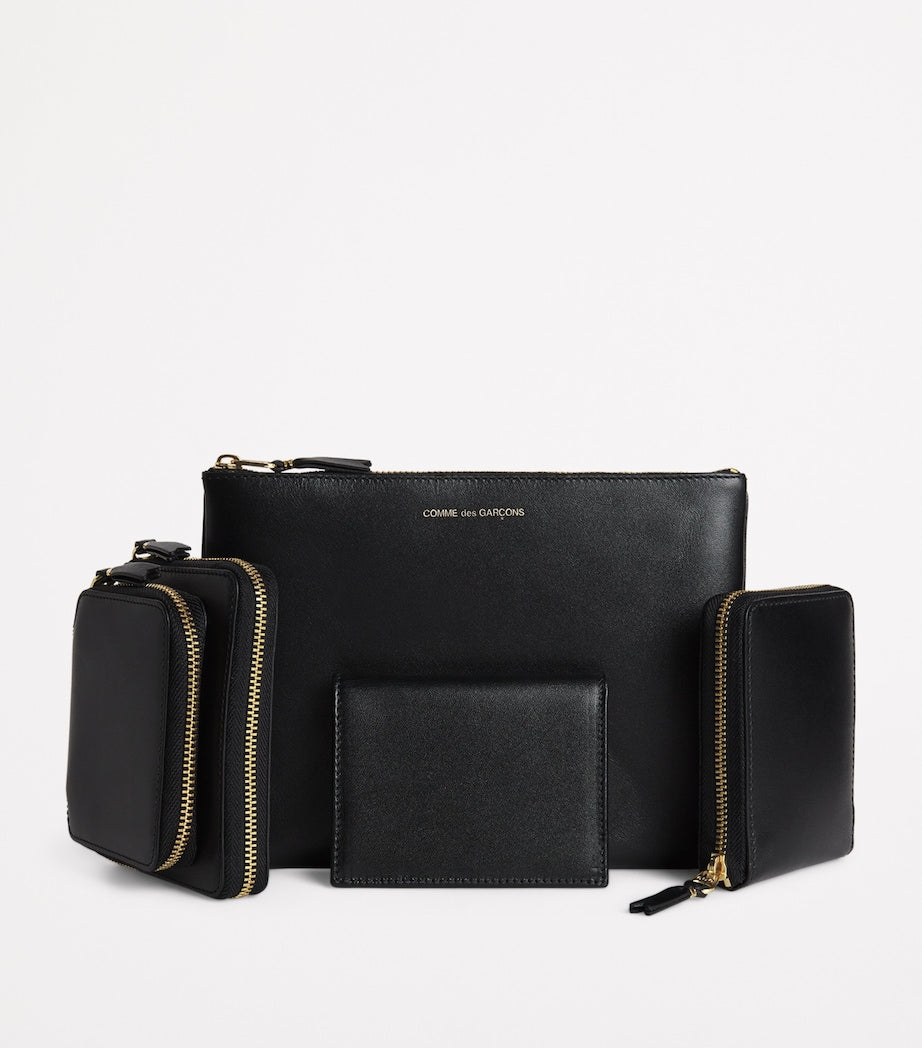 Comme des Garçons zipped leather wallet - British product
