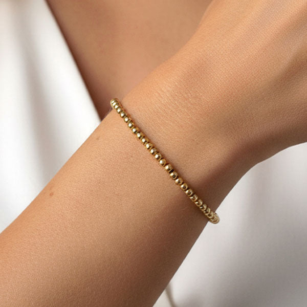 MUCHV 3mm ball bracelet in 18k gold (British brand)