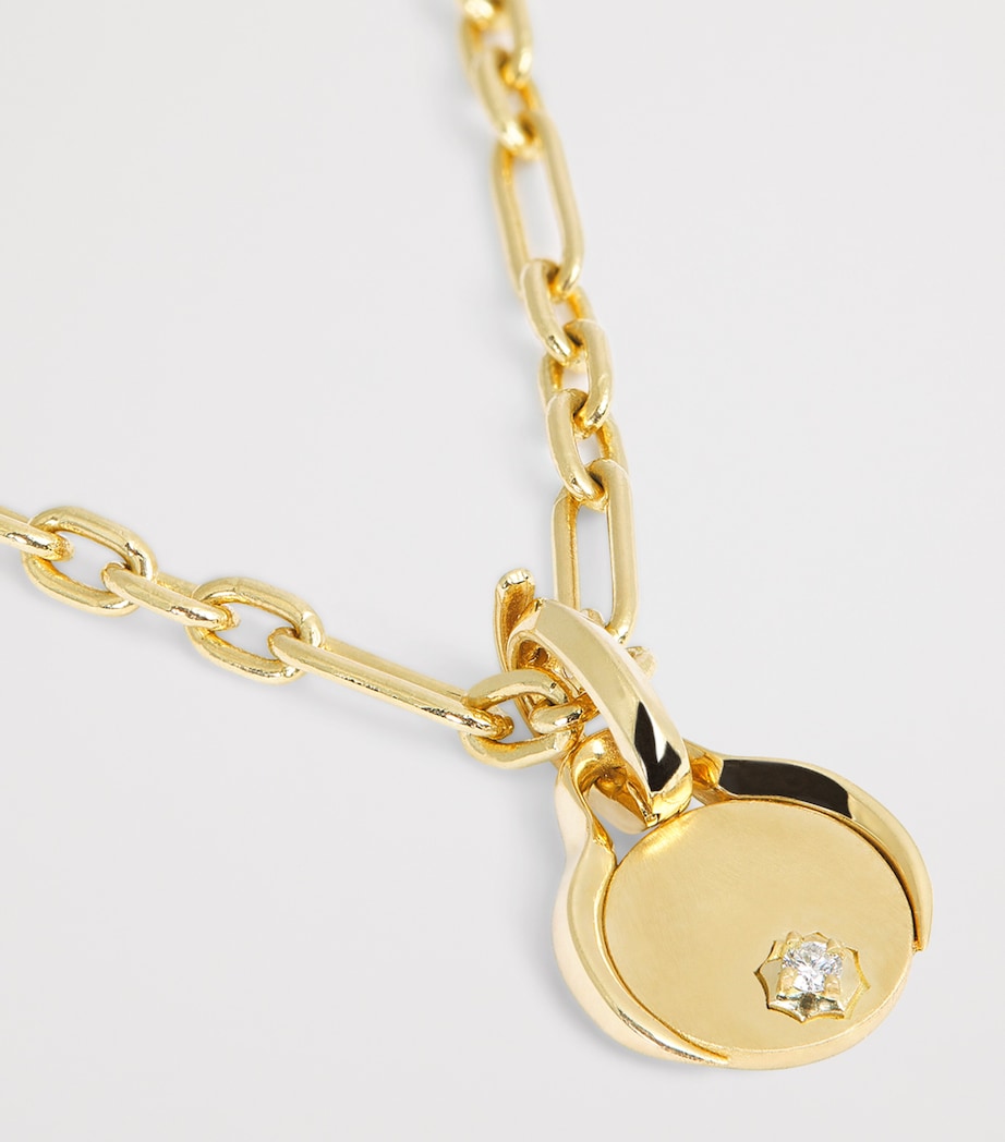 Jade Trau mini yellow gold diamond charm (British brand)