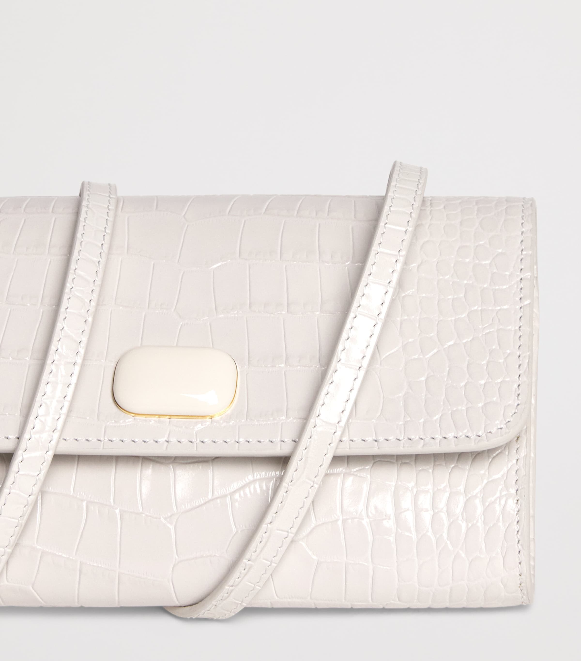 Jeffrey Levinson leather croc-embossed clutch bag, UK version