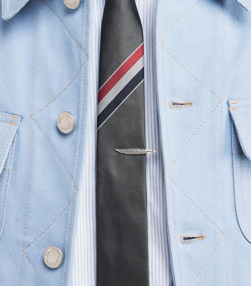 Thom Browne feather tie bar in sterling silver, imported from the UK