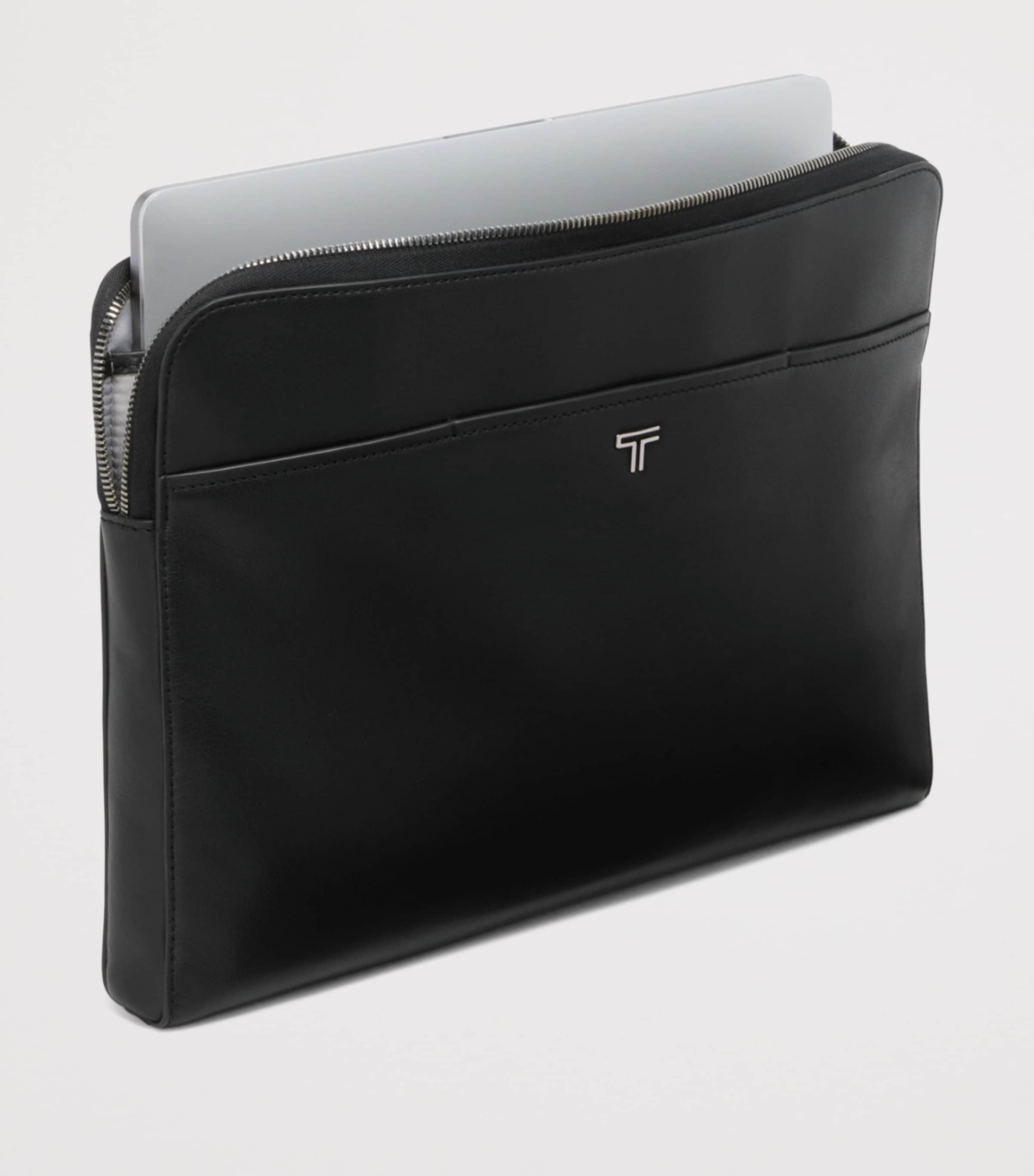 Tumi leather laptop sleeve for 14-inch screens (British brand)