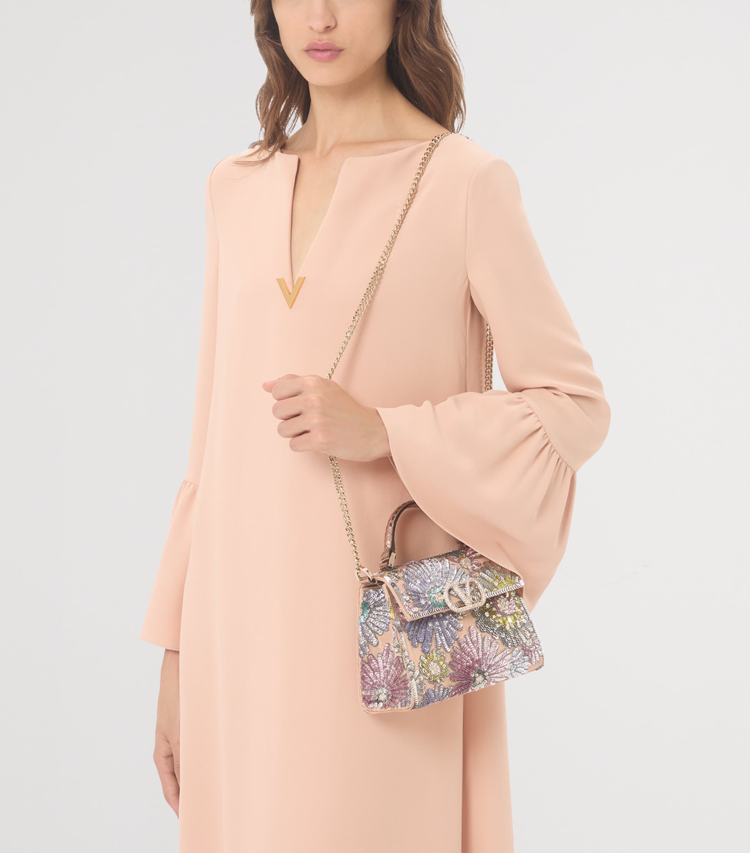 Valentino Garavani VSLING sequinned top-handle bag - British product